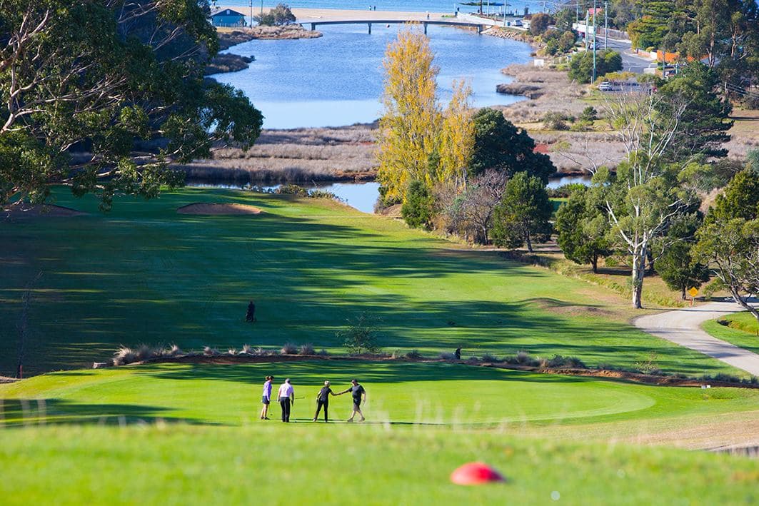 Members walking the fairway together