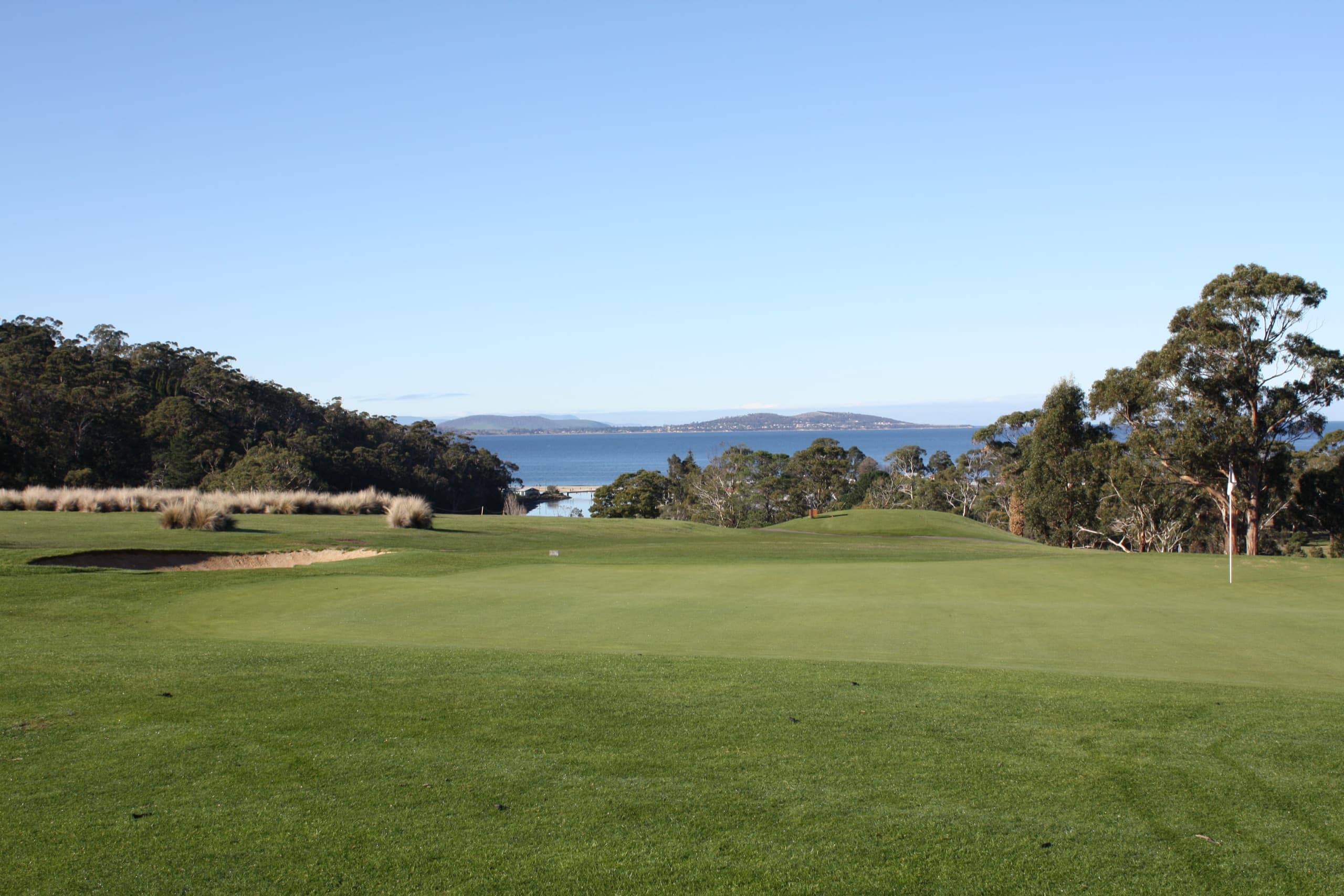 An elevated green with the D'Entrecasteaux Channel beyond